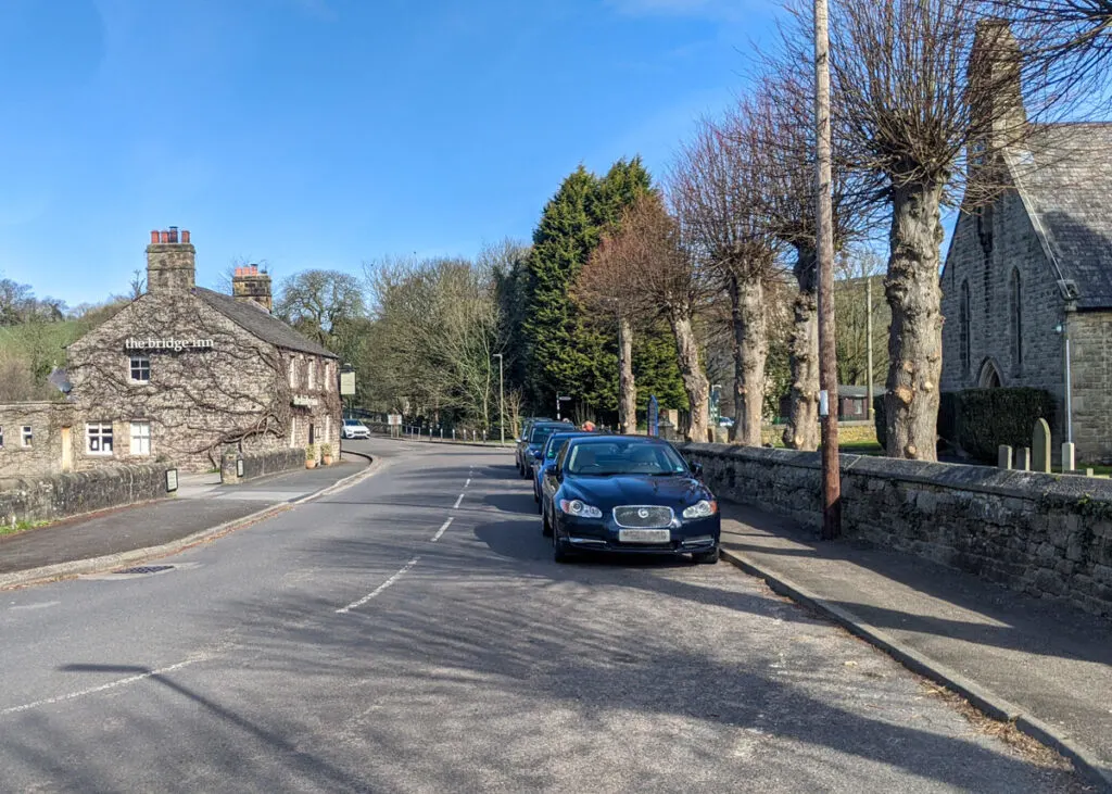 roadside parking at The Bridge Inn, Calver