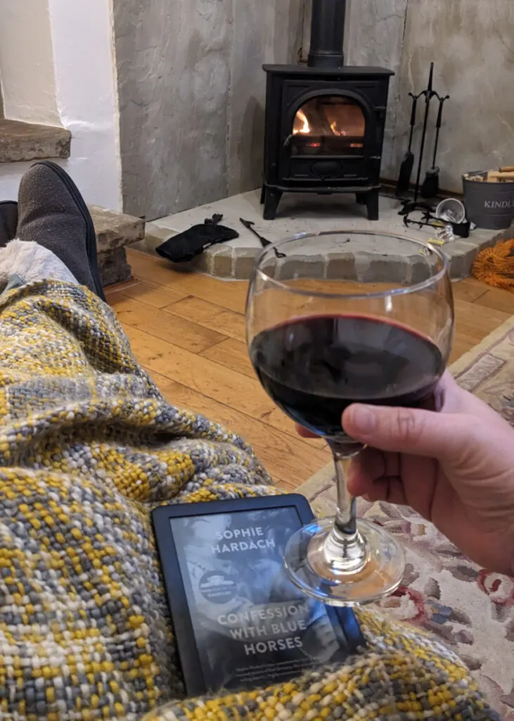 wine and log fire at Haddon Grove cottages